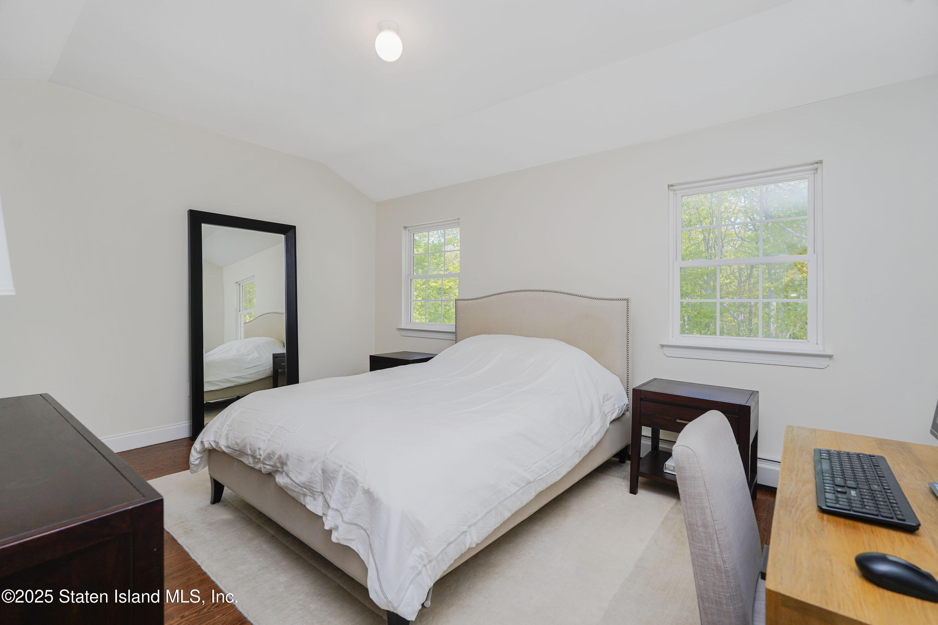 121 Presentation Circle Staten Island, NY 10312 - Photo 26 of 39 a bedroom with a bed and a window