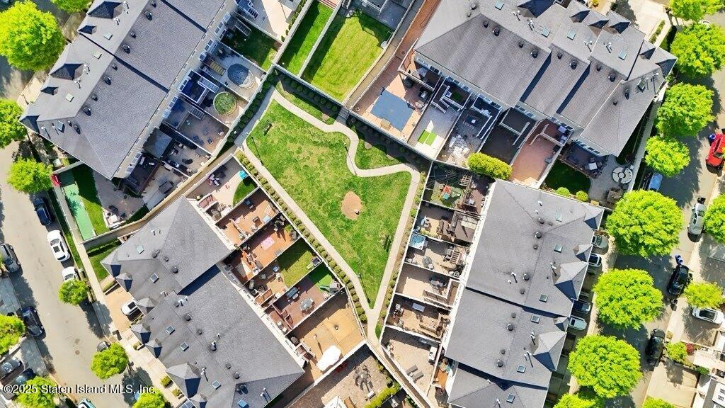 121 Presentation Circle Staten Island, NY 10312 - Photo 37 of 39 an aerial view of a house with a yard and potted plants