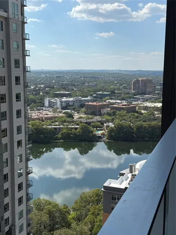 a view of a lake with a city