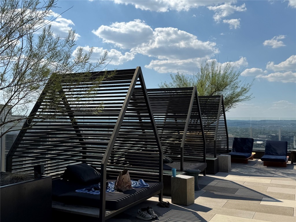 48 East Avenue, Unit 2509 Austin, TX 78701 - Photo 27 of 30 a view of barbeque area with wooden stairs