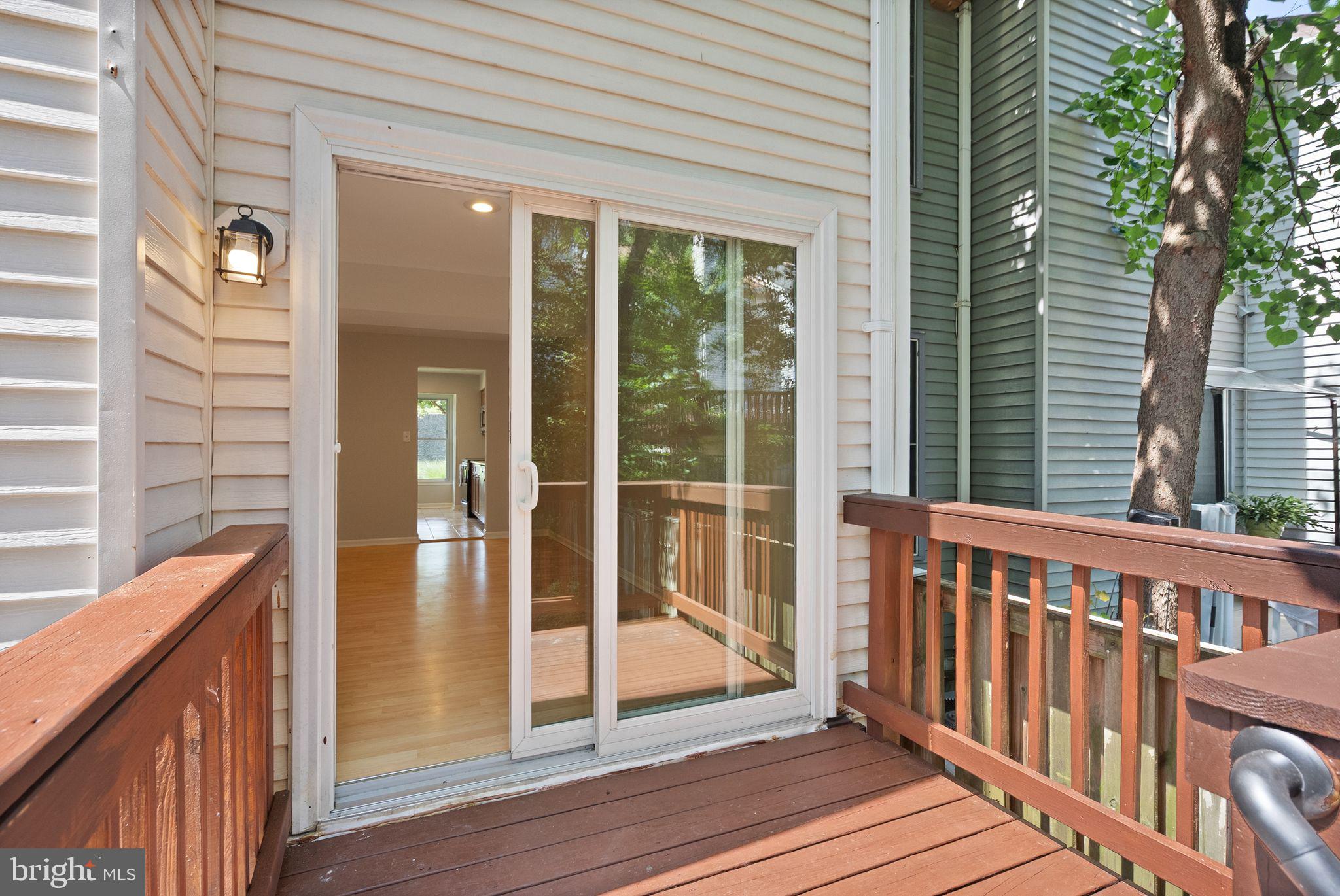 7390 Stream Way Springfield, VA 22152 - Photo 32 of 35 Sliding door to the backyard