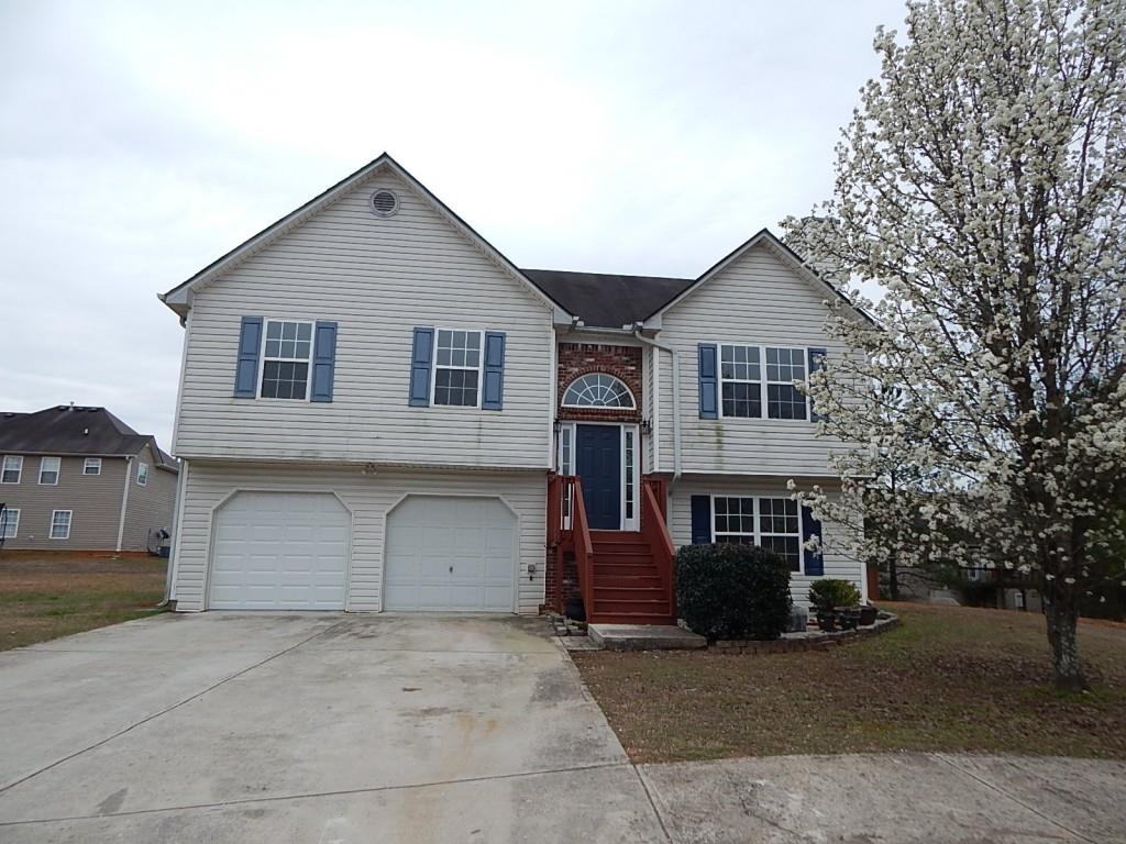 4913 Thicket Ridge Trace Douglasville, GA 30134 - Photo 1 of 1 a house view with a outdoor space