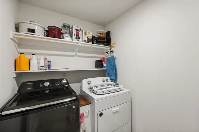 a kitchen with a stove and a cabinets