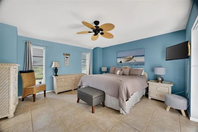 a bedroom with a bed and furniture