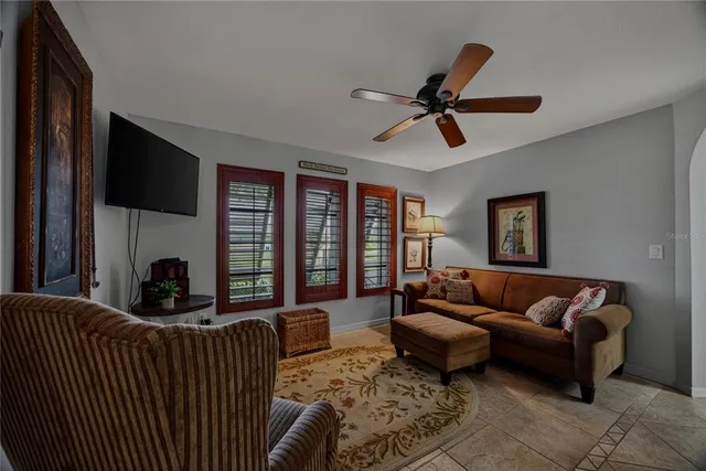 a kitchen with stainless steel appliances a refrigerator sink and microwave