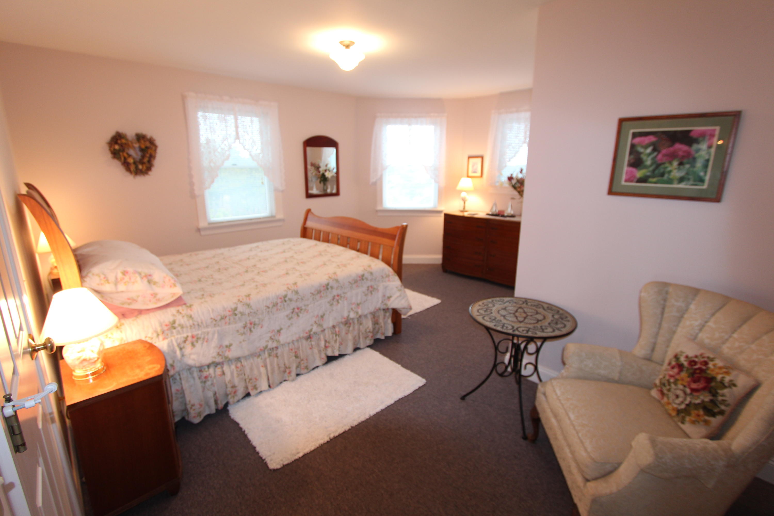 4 High Ridge Rd Extension Truro, MA 02666 - Photo 12 of 46 a bedroom with furniture and a wooden floor