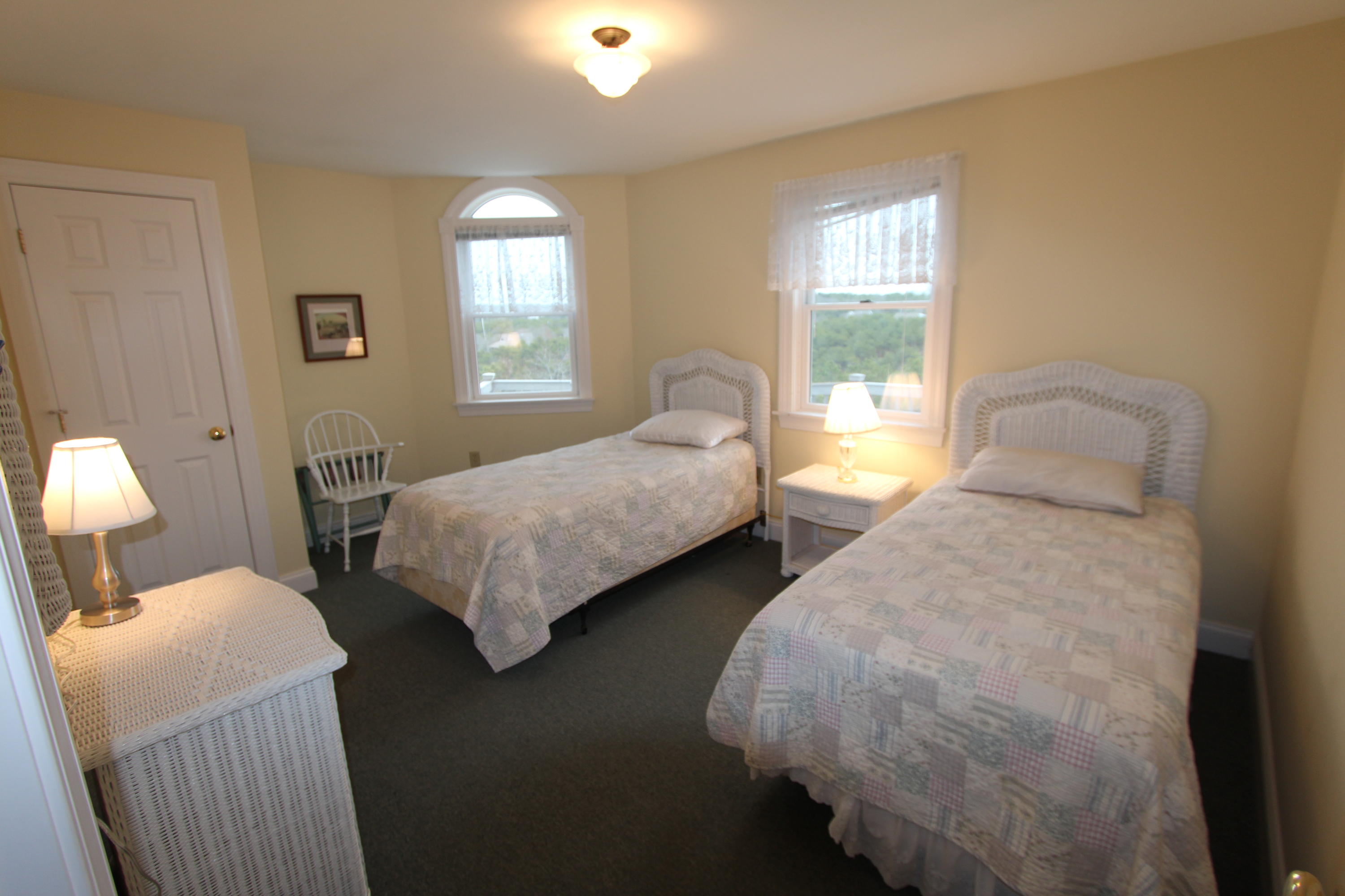 4 High Ridge Rd Extension Truro, MA 02666 - Photo 15 of 46 a bedroom with two beds and a window