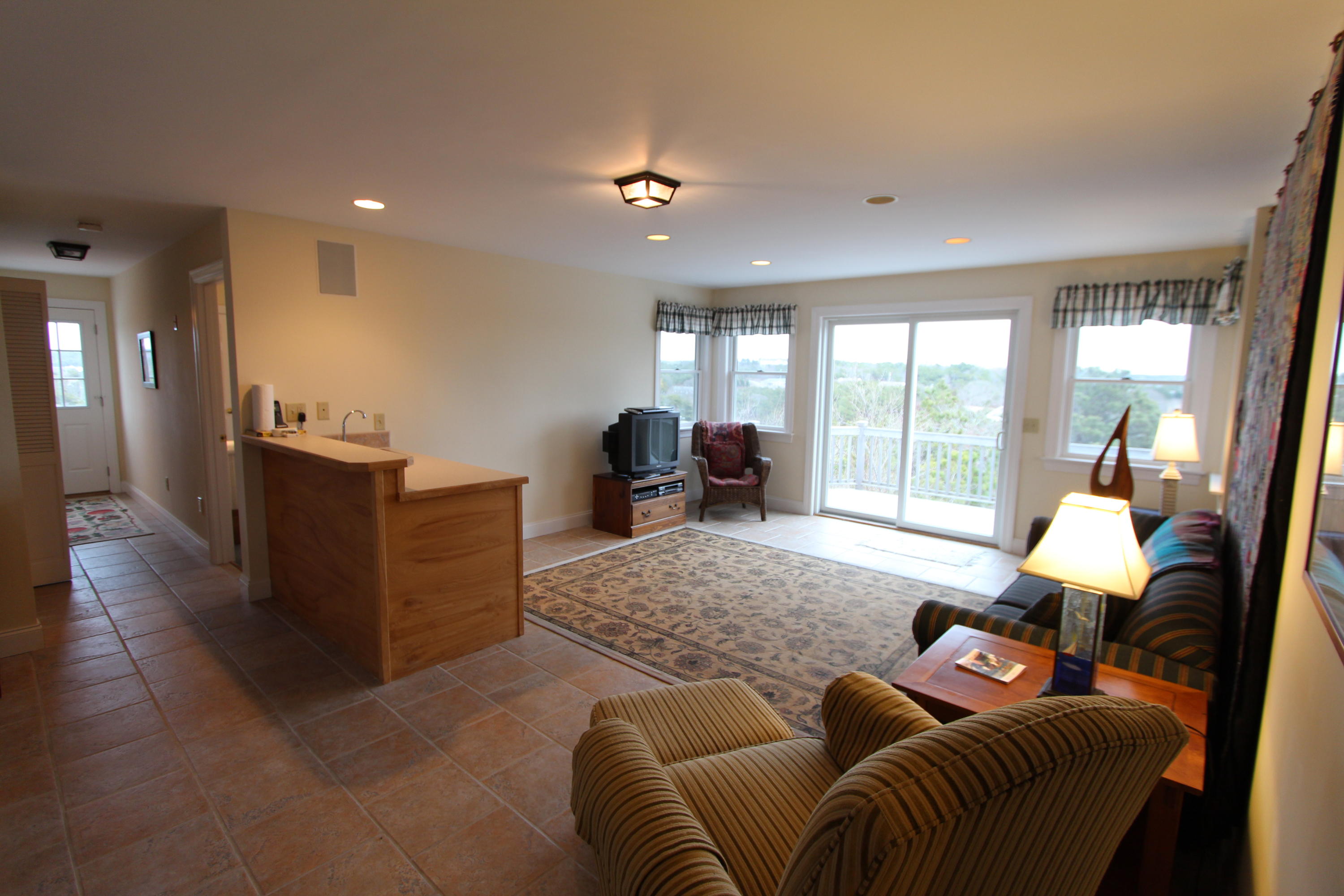 4 High Ridge Rd Extension Truro, MA 02666 - Photo 18 of 46 a living room with furniture and large windows