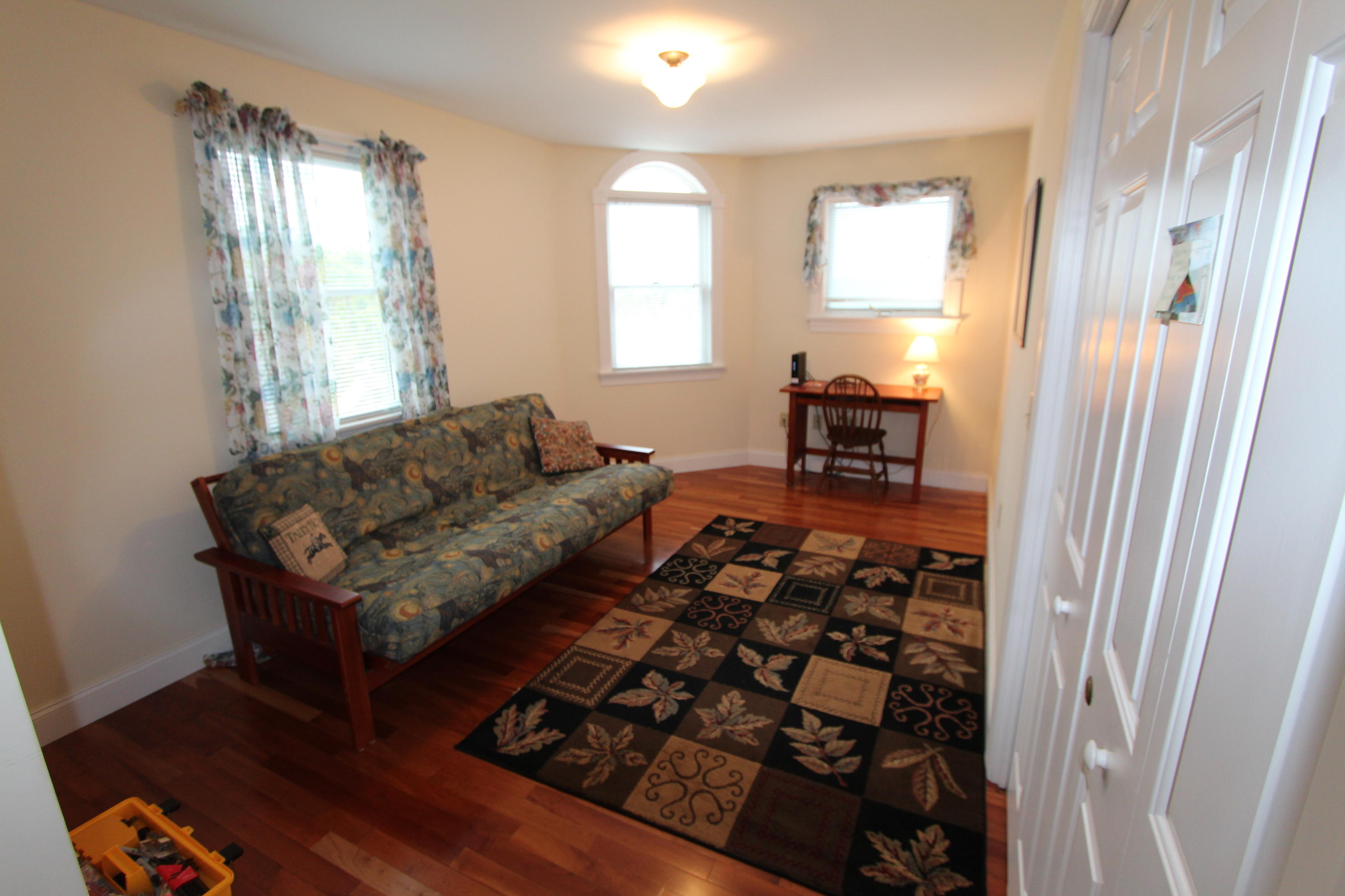 4 High Ridge Rd Extension Truro, MA 02666 - Photo 20 of 46 a living room with furniture and a flat screen tv