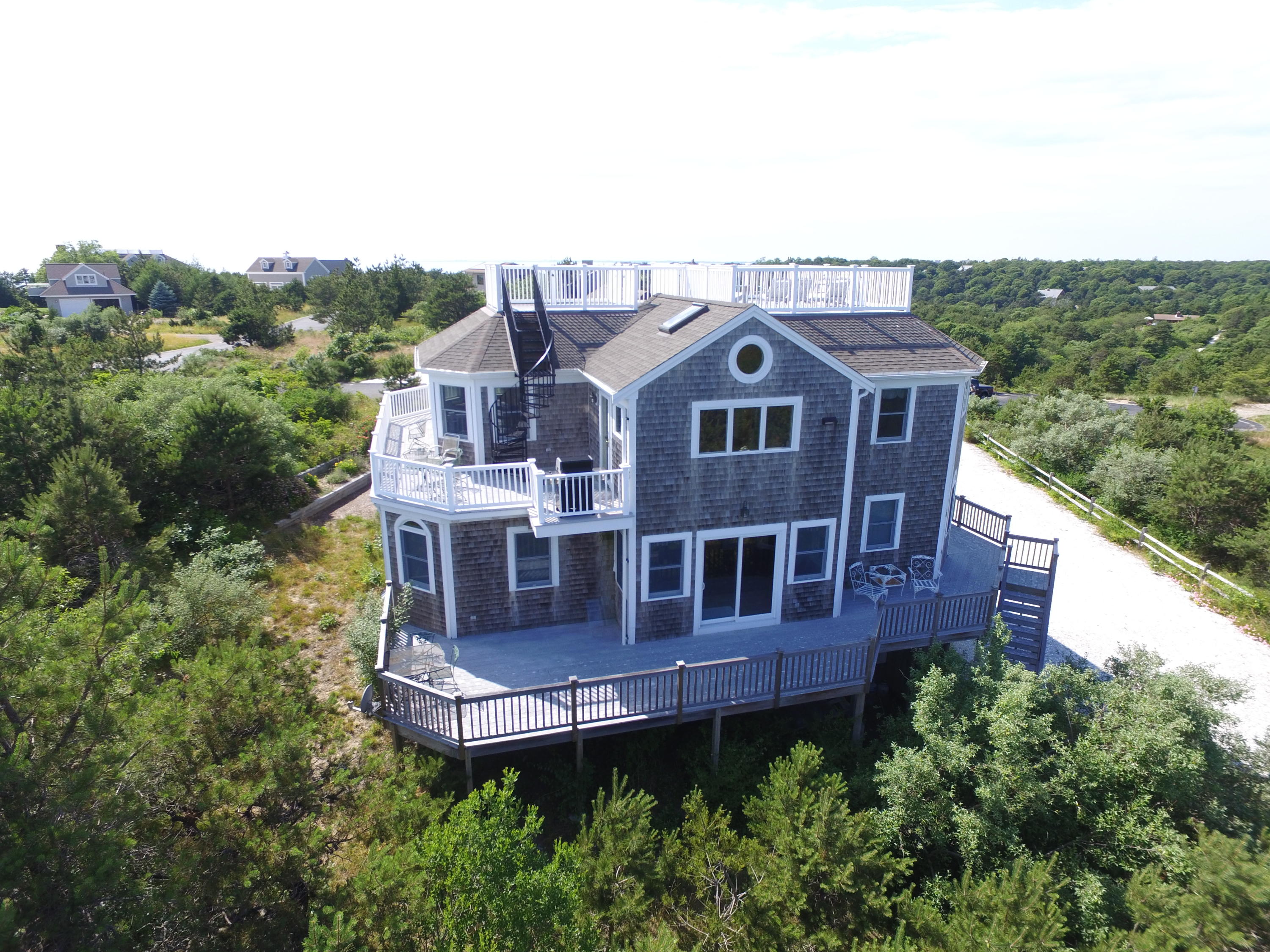 4 High Ridge Rd Extension Truro, MA 02666 - Photo 2 of 46 an aerial view of a house with a yard