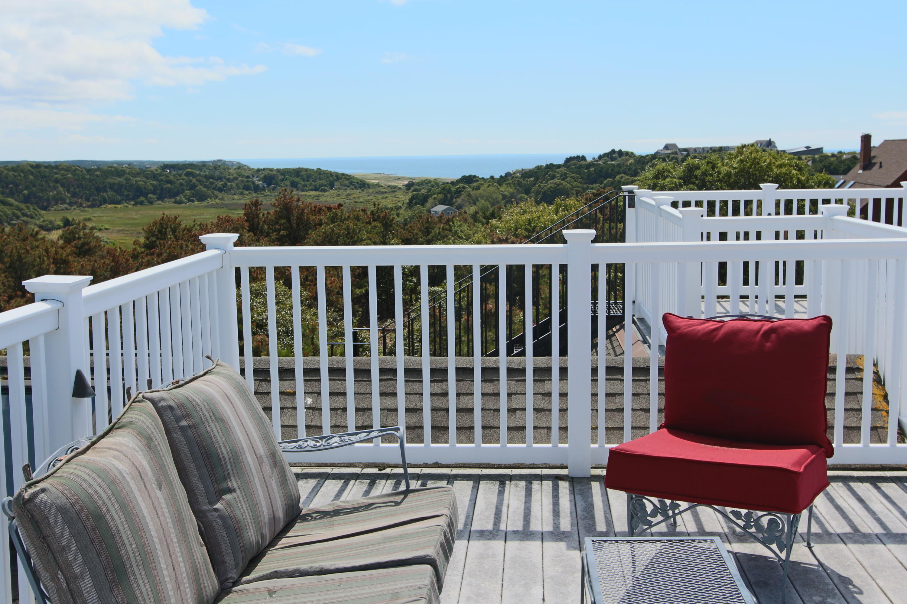 4 High Ridge Rd Extension Truro, MA 02666 - Photo 3 of 46 a view of a chair in a balcony