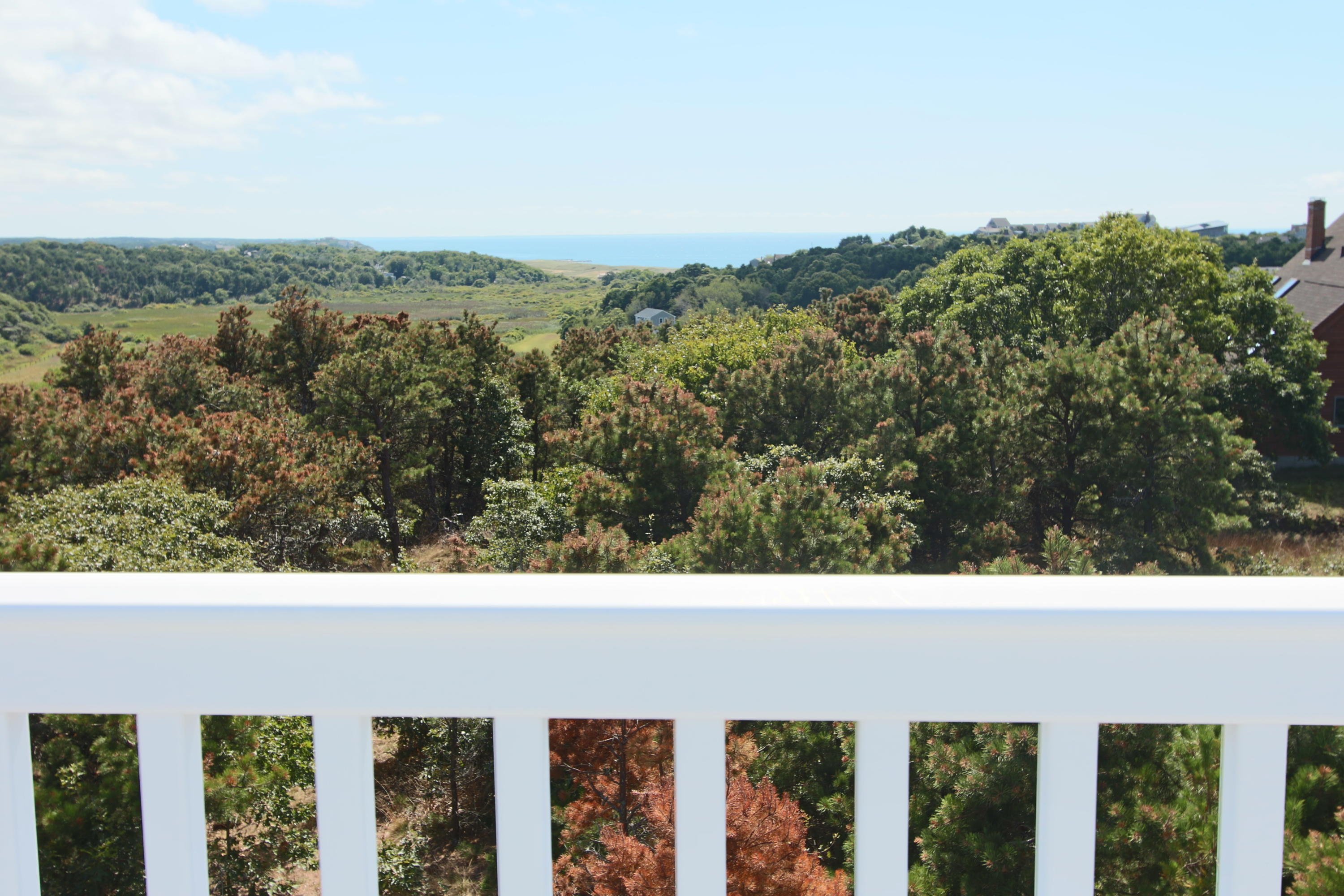 4 High Ridge Rd Extension Truro, MA 02666 - Photo 34 of 46 a view of a balcony with wooden floor and outdoor space