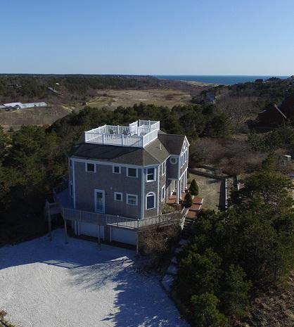 4 High Ridge Rd Extension Truro, MA 02666 - Photo 40 of 46 a view of a terrace with a garden