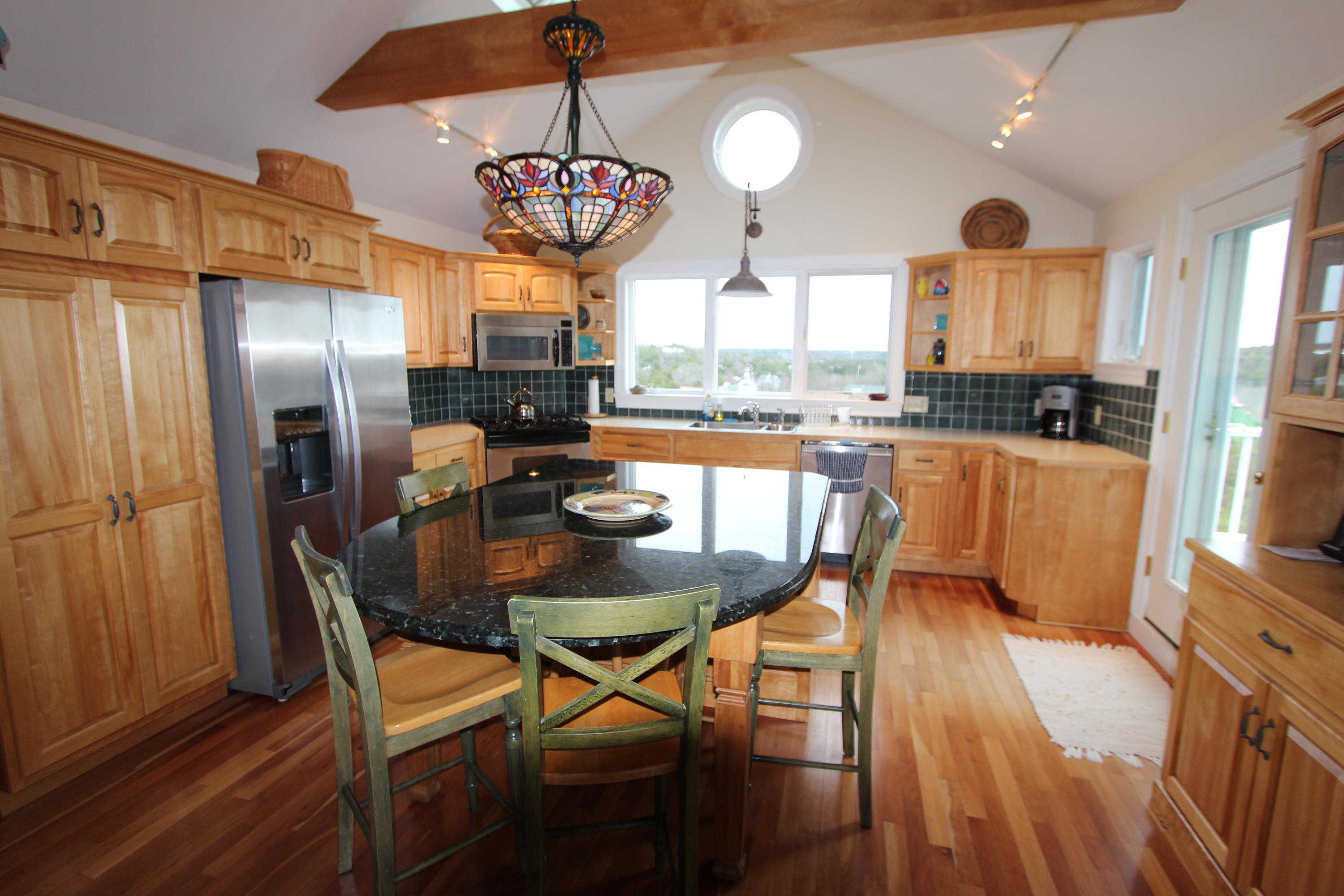 4 High Ridge Rd Extension Truro, MA 02666 - Photo 8 of 46 a view of a dining room with furniture window and wooden floor