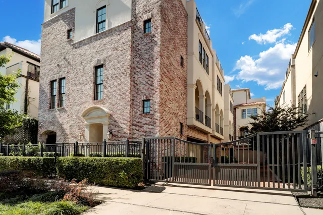 a view of a brick buidling front of house