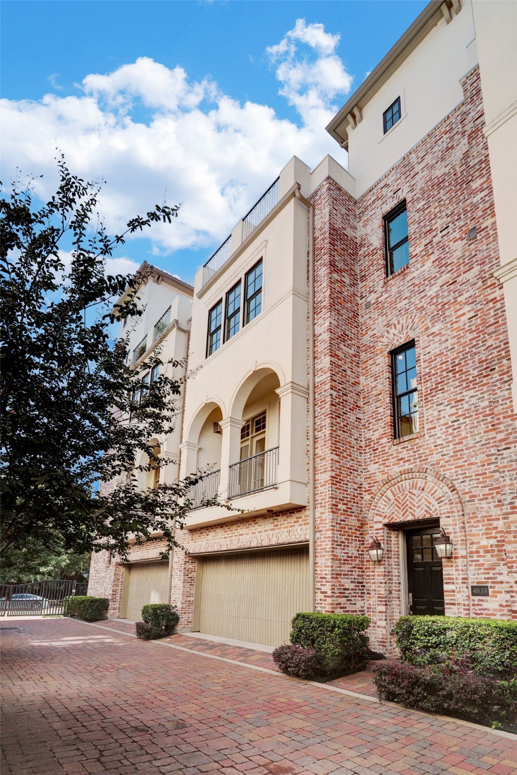 4838 Austin Street Houston, TX 77004 - Photo 2 of 27 a front view of a house with garden