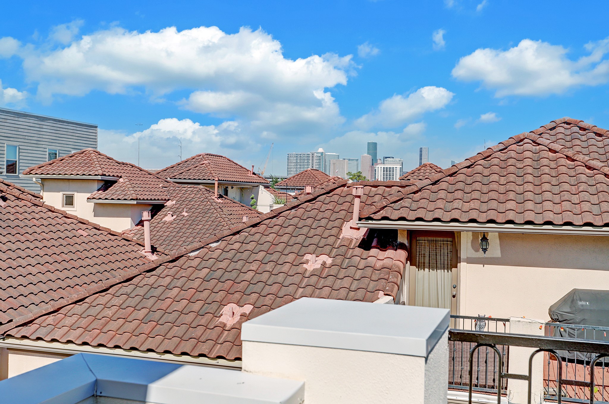 4838 Austin Street Houston, TX 77004 - Photo 26 of 27 a backyard of a house with table and chairs