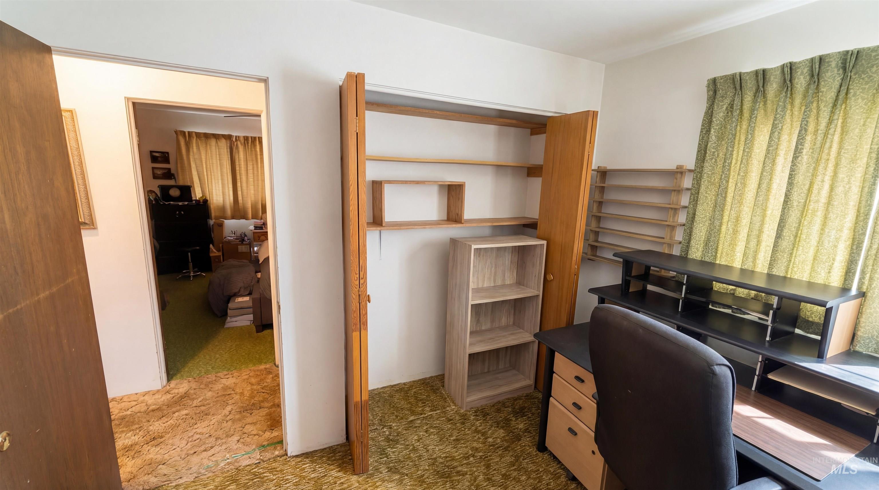 19076 Pleasant Avenue Caldwell, ID 83607 - Photo 17 of 37 Home office with light colored carpet