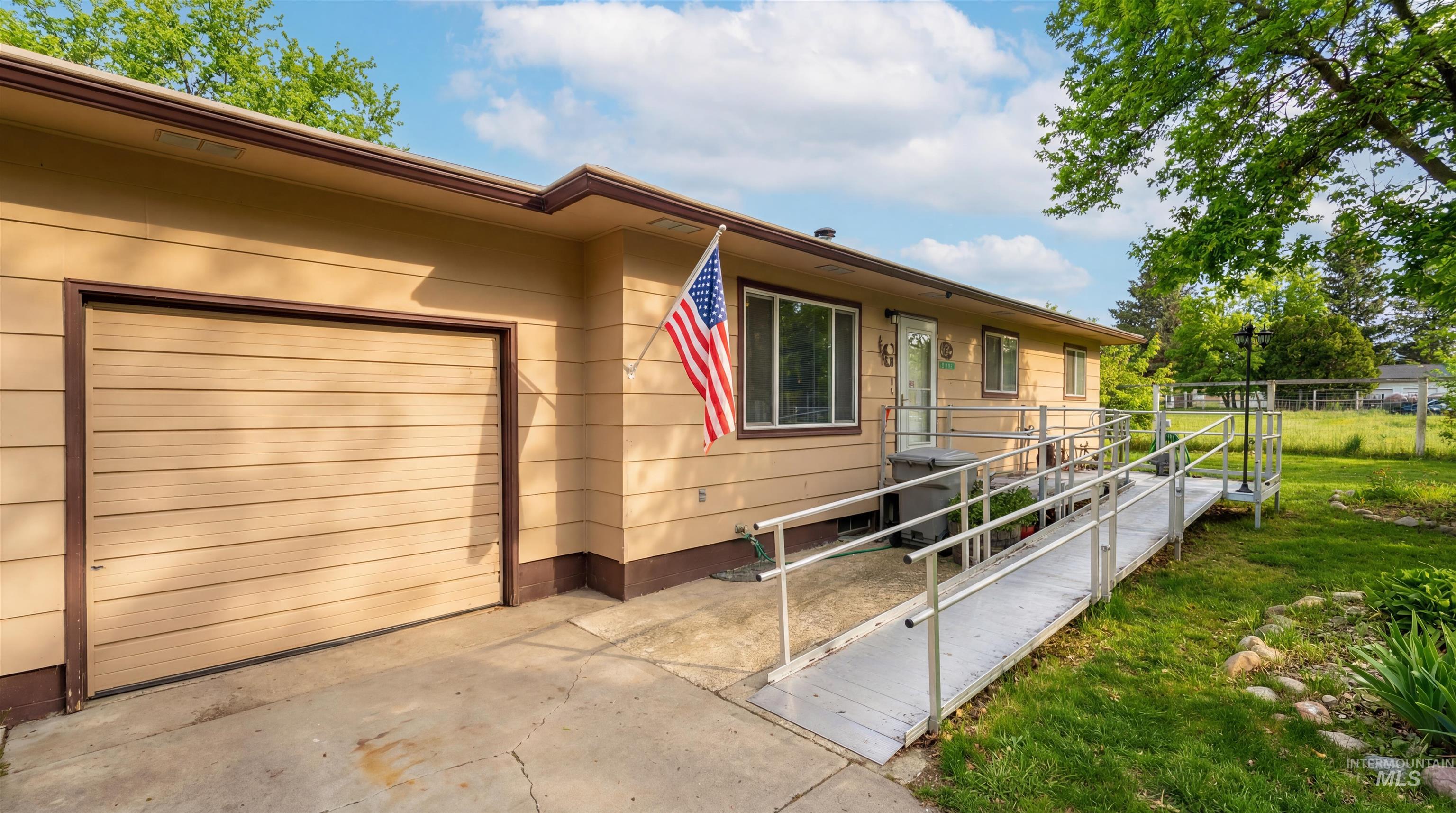 19076 Pleasant Avenue Caldwell, ID 83607 - Photo 2 of 37 View of side of home with a garage
