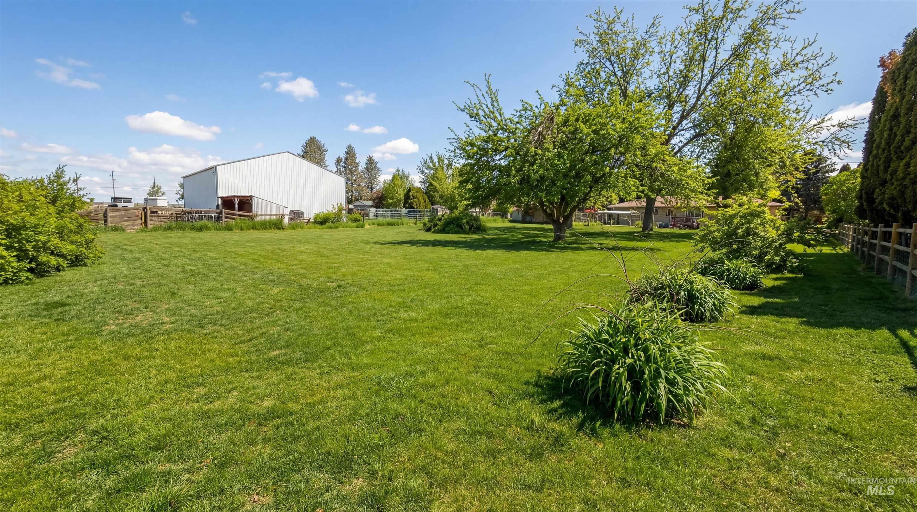 19076 Pleasant Avenue Caldwell, ID 83607 - Photo 31 of 37 View of yard featuring an outdoor structure