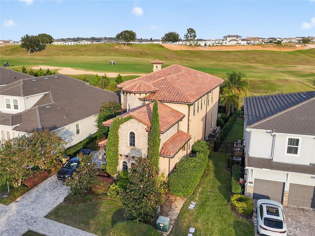 a aerial view of a house with a ocean view