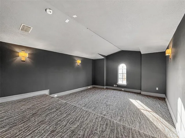 a view of a livingroom with a staircase