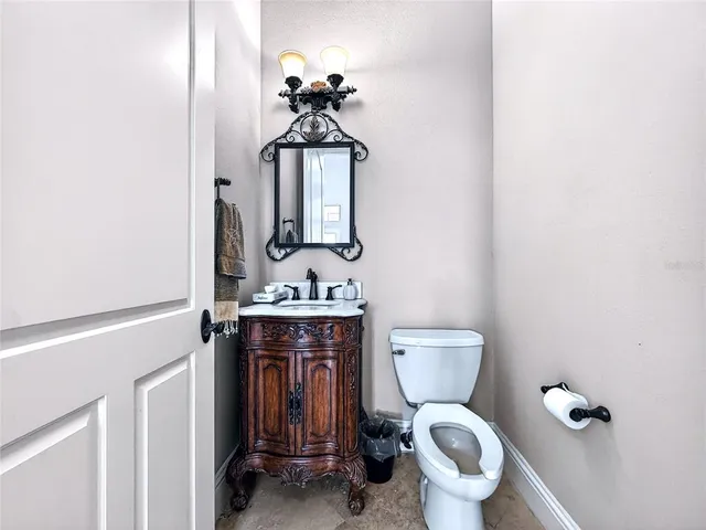 a bathroom with a toilet and a sink