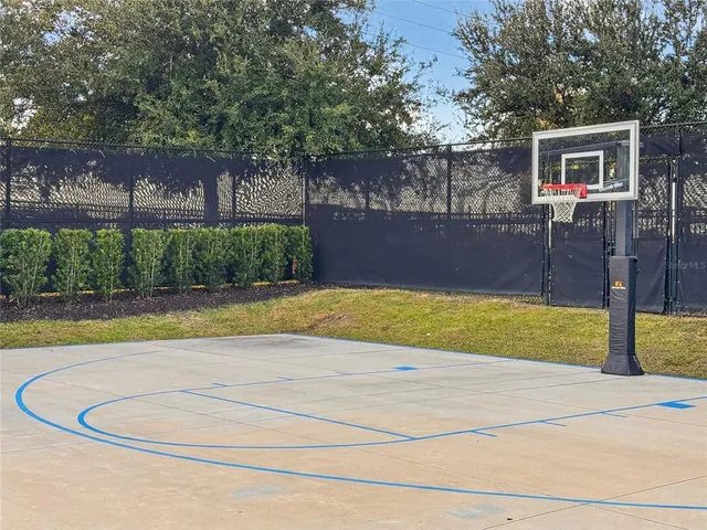 a view of a swimming pool with a lounge chairs