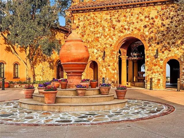 a building with fountain in front of it