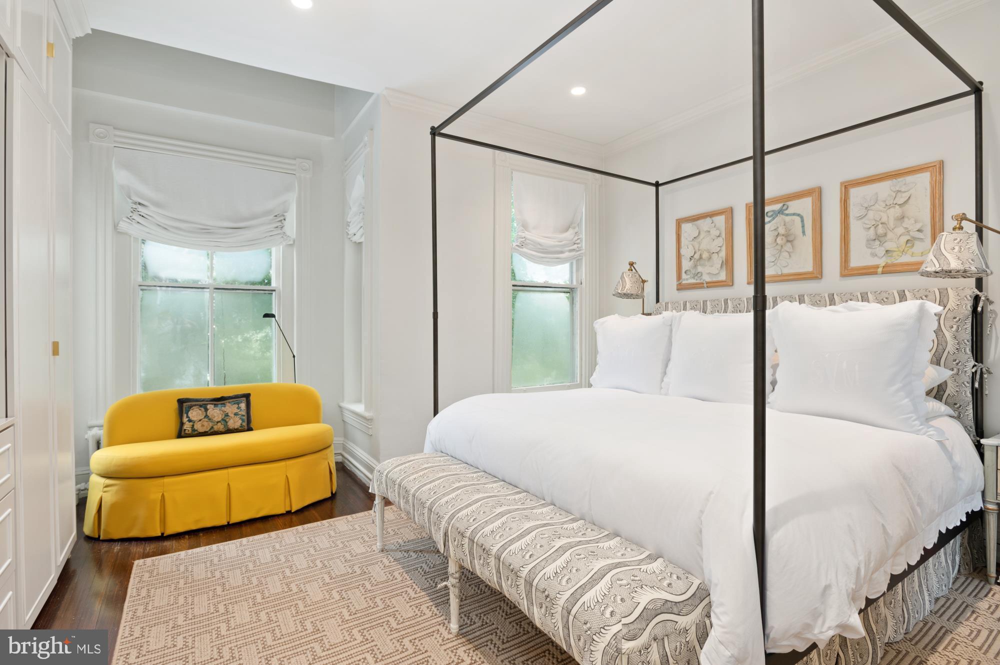 1333 30th Street Northwest Washington, DC 20007 - Photo 12 of 26 a bedroom with a bed and a couch