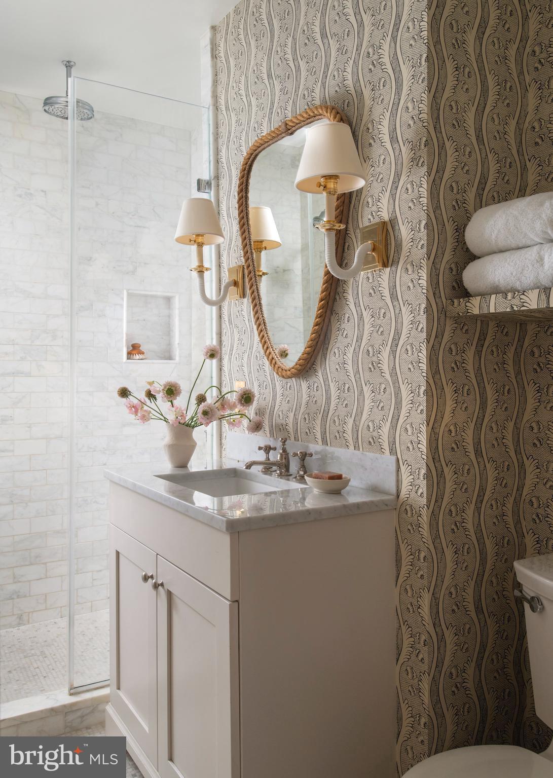 1333 30th Street Northwest Washington, DC 20007 - Photo 16 of 26 a bathroom with a sink and mirror