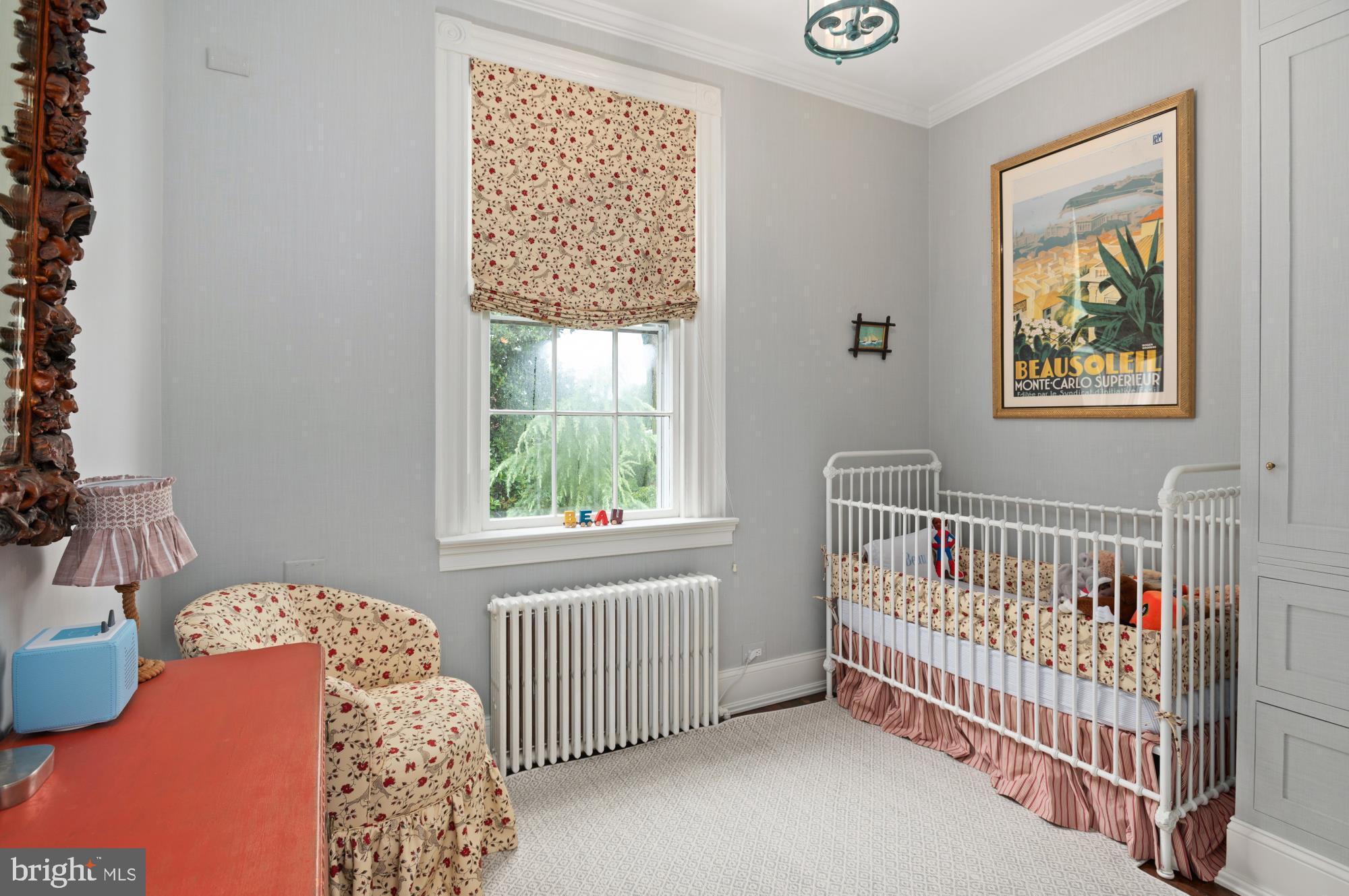 1333 30th Street Northwest Washington, DC 20007 - Photo 19 of 26 a bedroom with a bed and a window