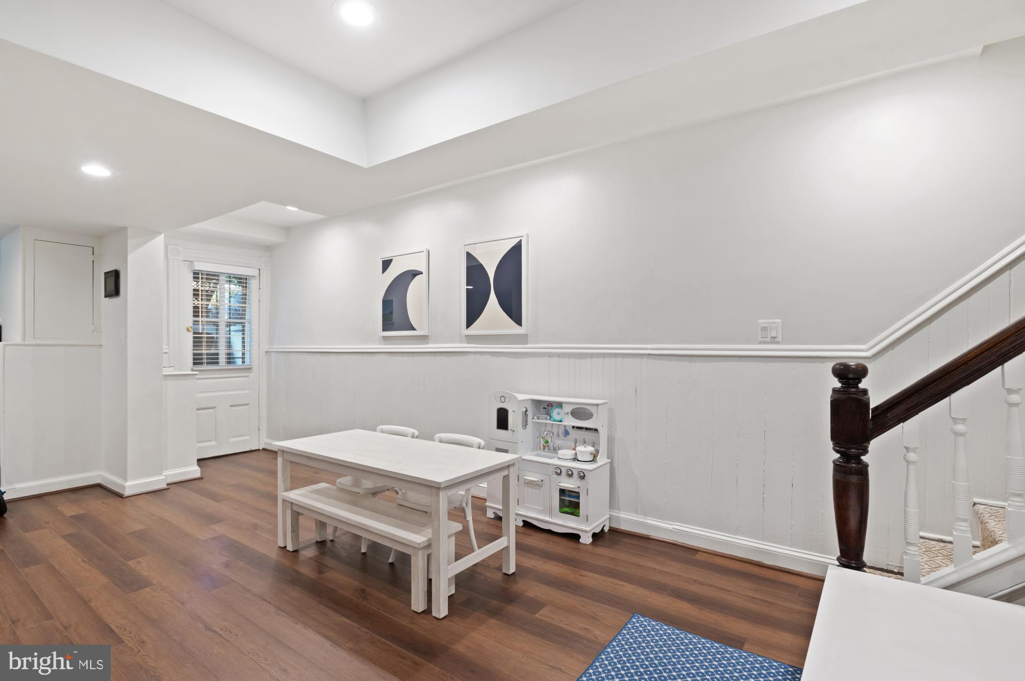 1333 30th Street Northwest Washington, DC 20007 - Photo 23 of 26 a room with furniture and a wooden floor