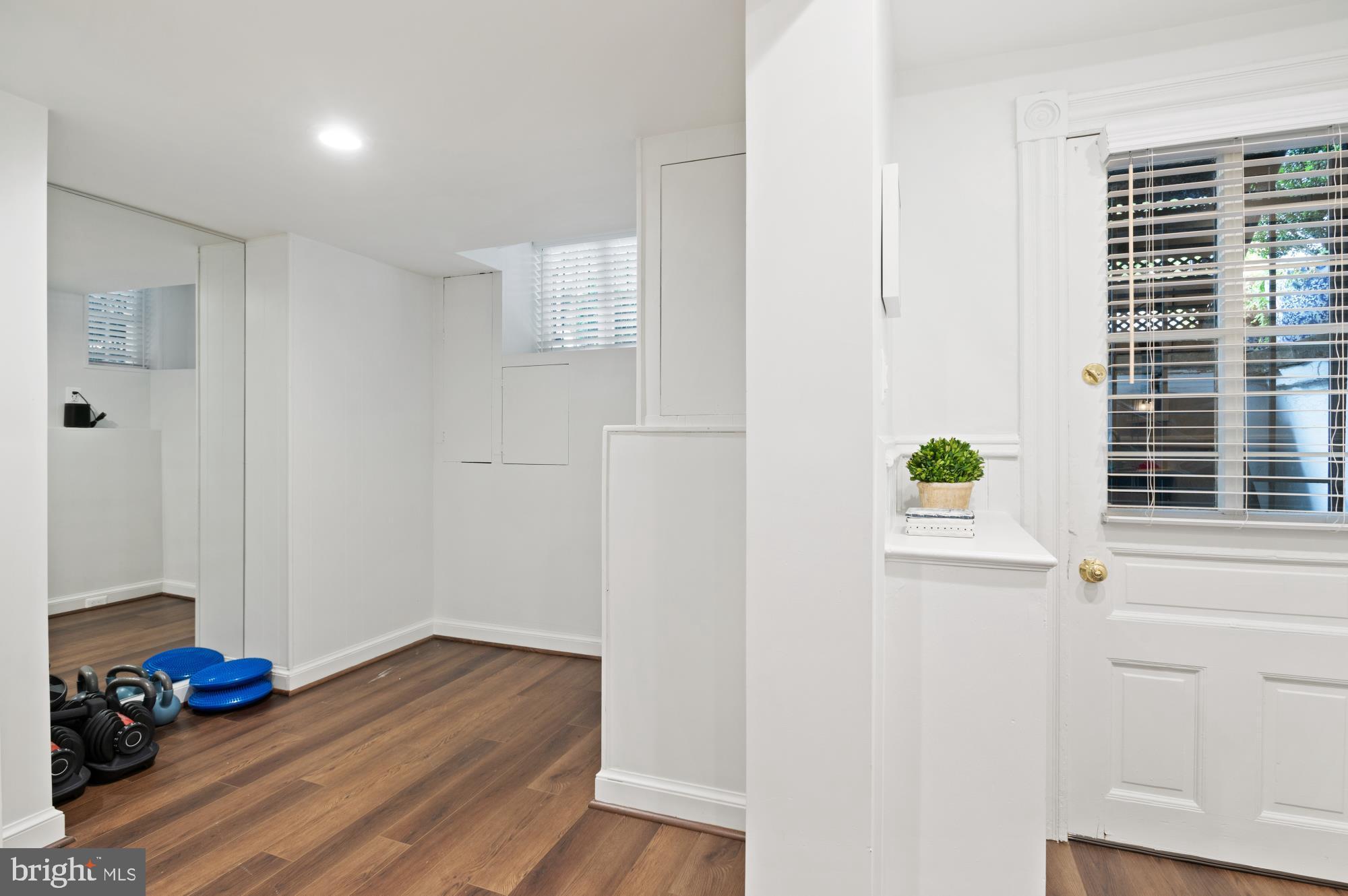 1333 30th Street Northwest Washington, DC 20007 - Photo 25 of 26 a bedroom with a bed and a window