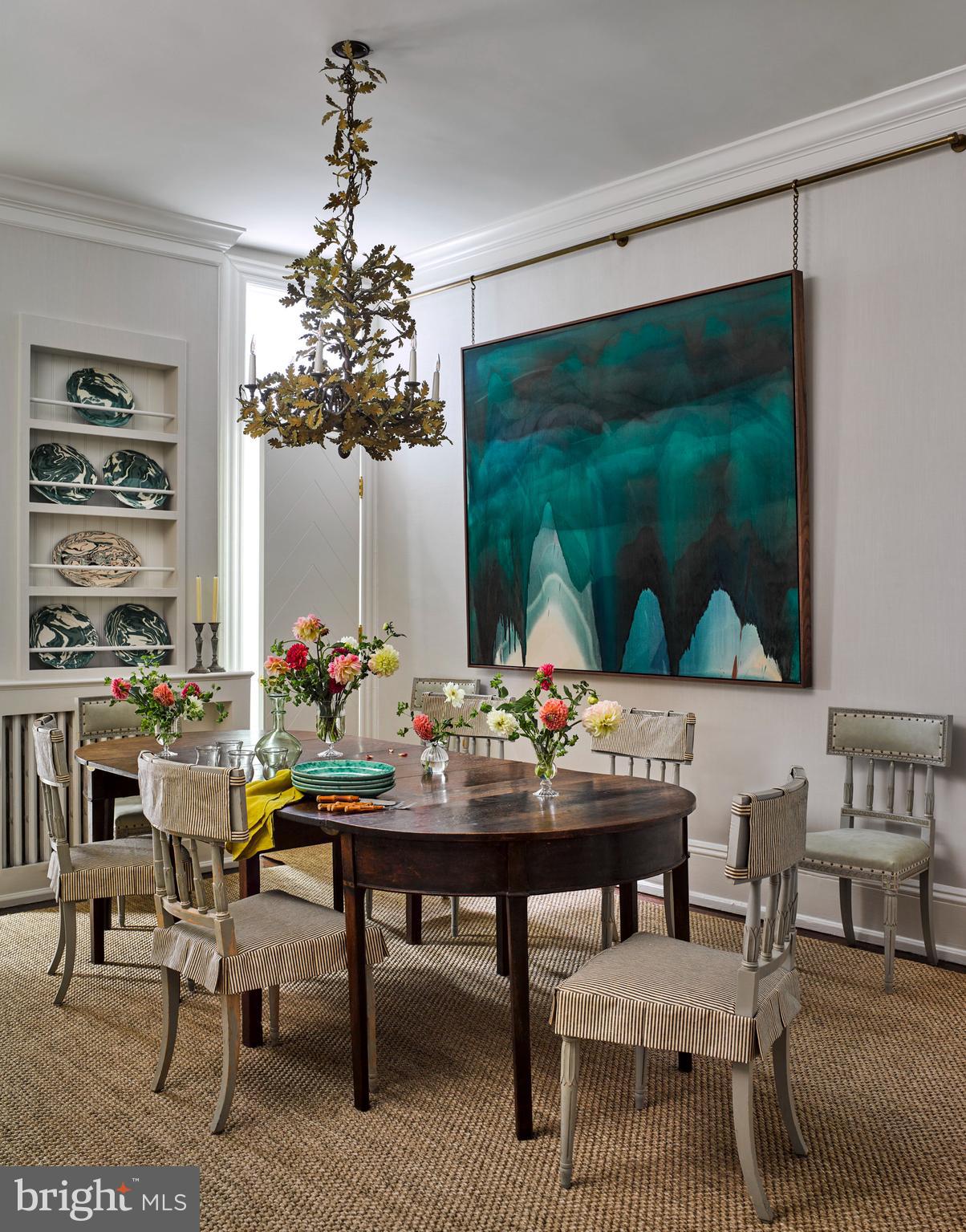 1333 30th Street Northwest Washington, DC 20007 - Photo 6 of 26 a view of a dining room with furniture and chandelier
