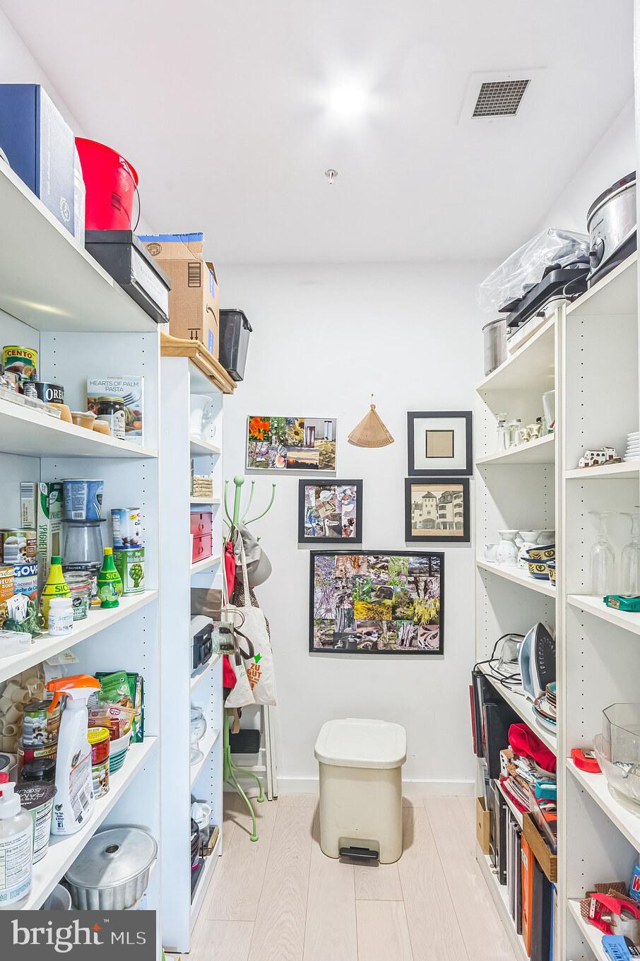 2402 Windrow Drive Princeton, NJ 08540 - Photo 16 of 19 a utility room with lots of clutter and toys