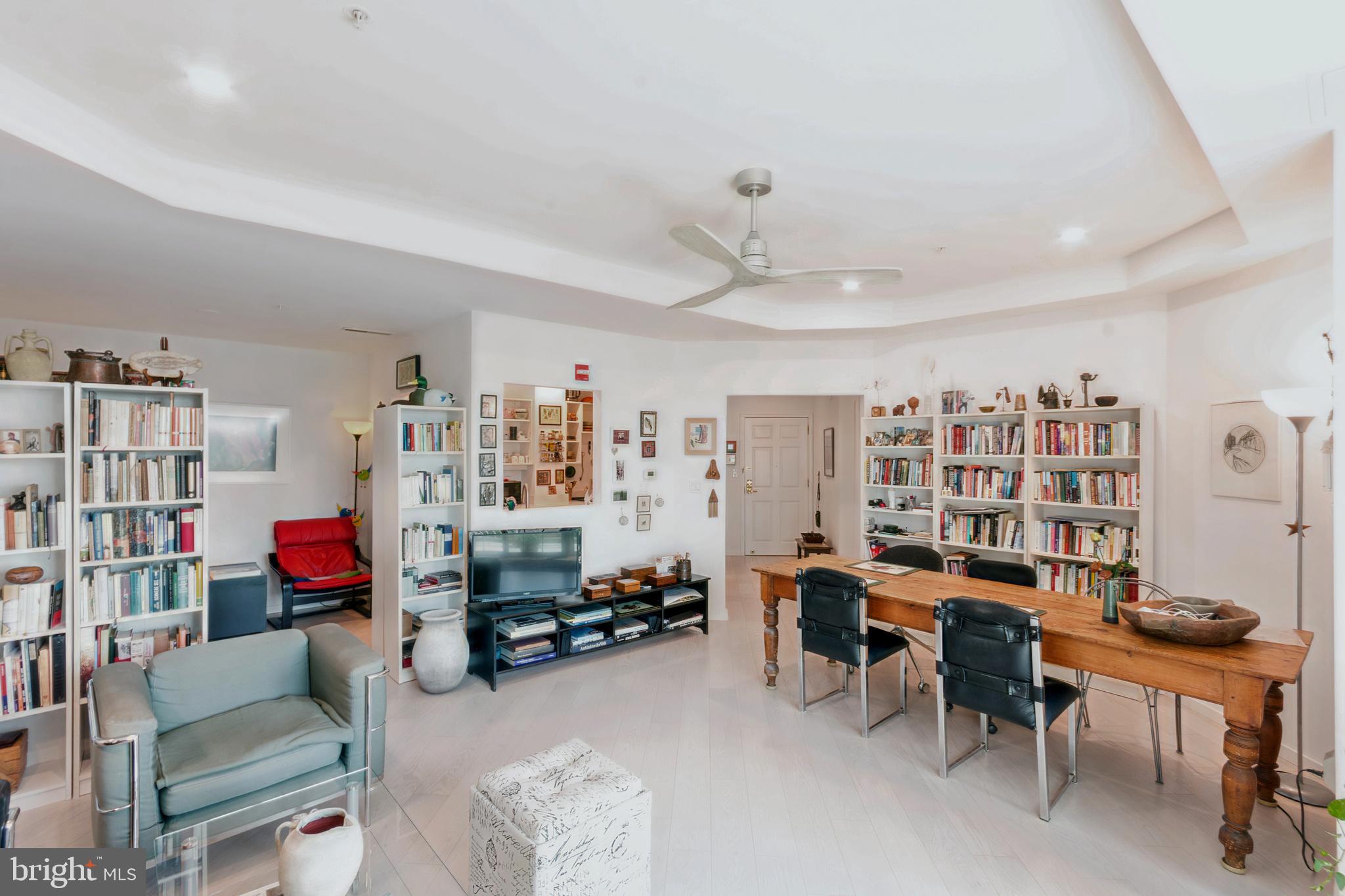 2402 Windrow Drive Princeton, NJ 08540 - Photo 4 of 19 a view of a livingroom with furniture and a bookshelf