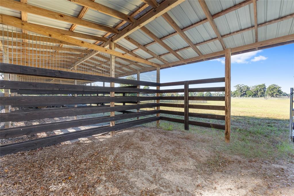 15269 Northeast 15th Court Citra, FL 32113 - Photo 14 of 17 a view of room with wooden walls