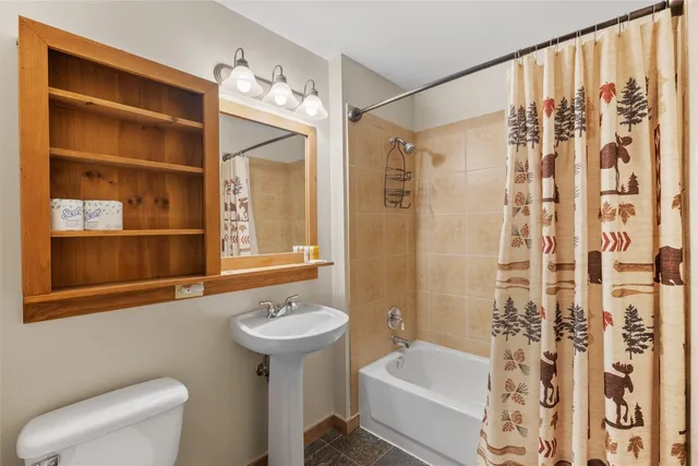 a view of front door with wooden floor