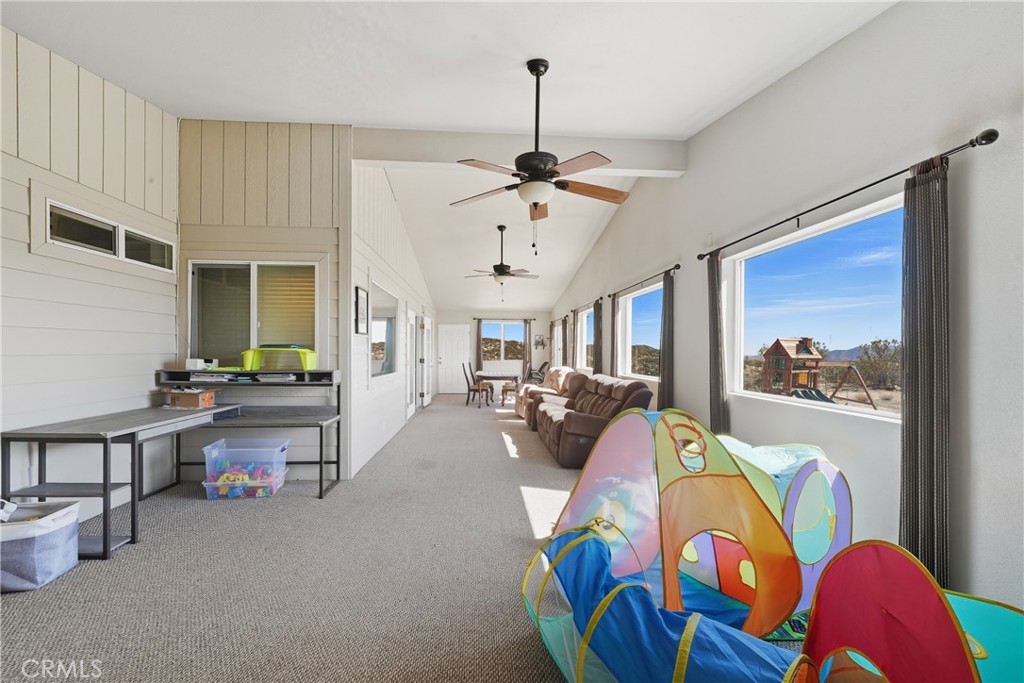 61455 Indian Paint Brush Road Anza, CA 92539 - Photo 16 of 60 a living room with furniture and a chandelier
