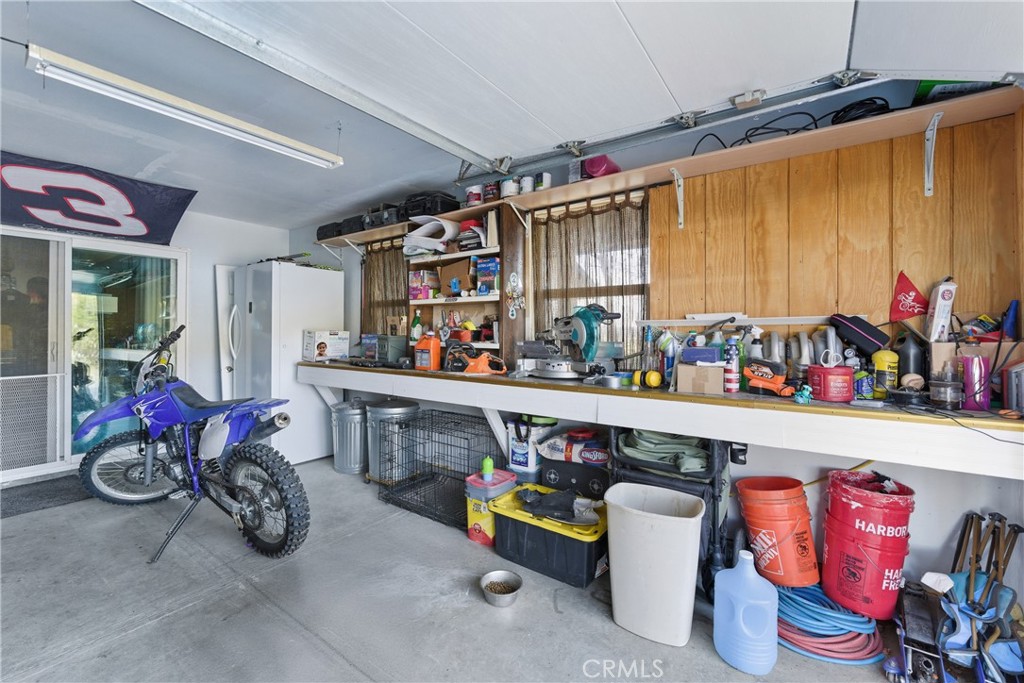 61455 Indian Paint Brush Road Anza, CA 92539 - Photo 33 of 60 a room with lots of furniture and clutter