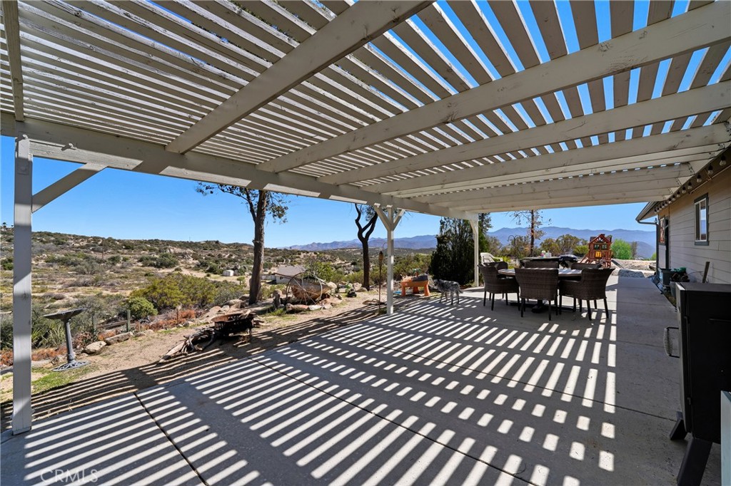 61455 Indian Paint Brush Road Anza, CA 92539 - Photo 40 of 60 a view of a patio with wooden floor