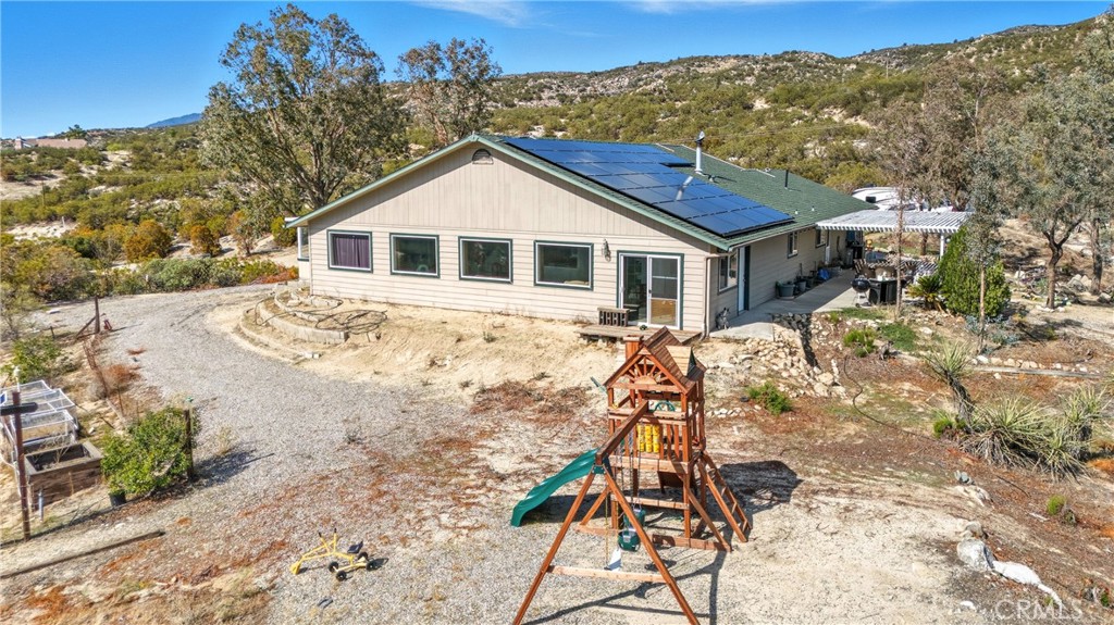 61455 Indian Paint Brush Road Anza, CA 92539 - Photo 45 of 60 a front view of a house with a yard