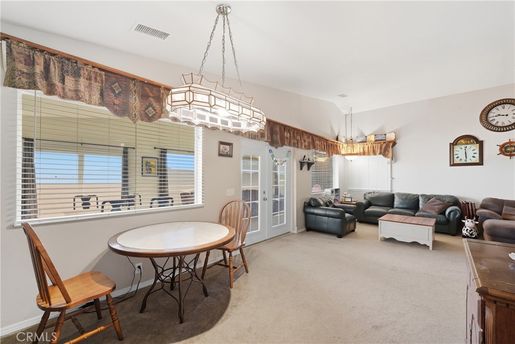 61455 Indian Paint Brush Road Anza, CA 92539 - Photo 5 of 60 a living room with furniture and a table