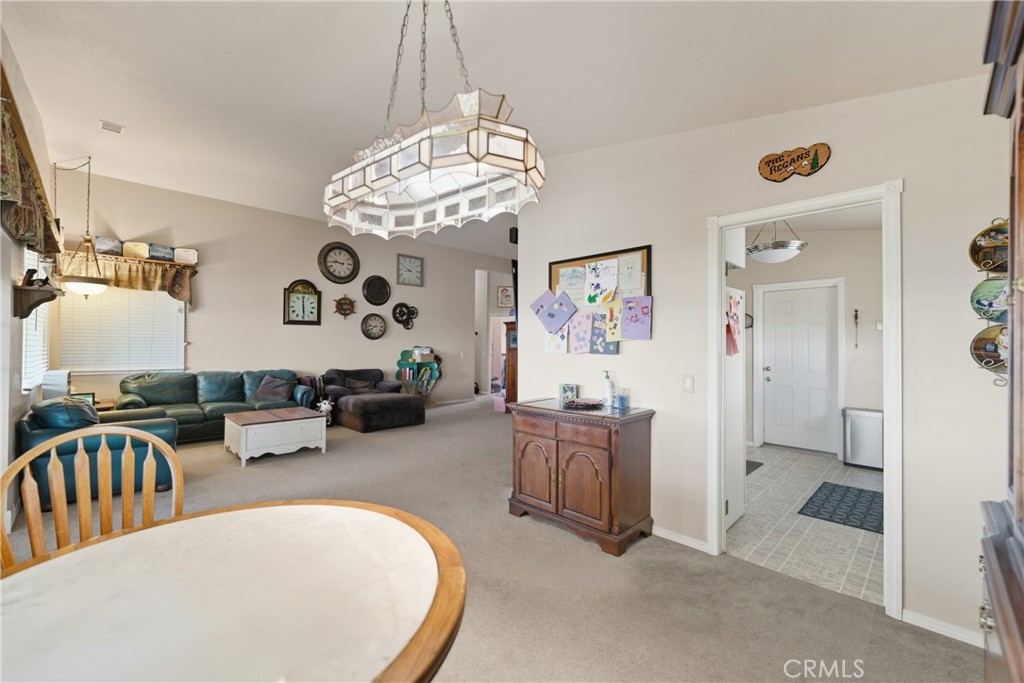 61455 Indian Paint Brush Road Anza, CA 92539 - Photo 6 of 60 a view of a livingroom with furniture and a chandelier