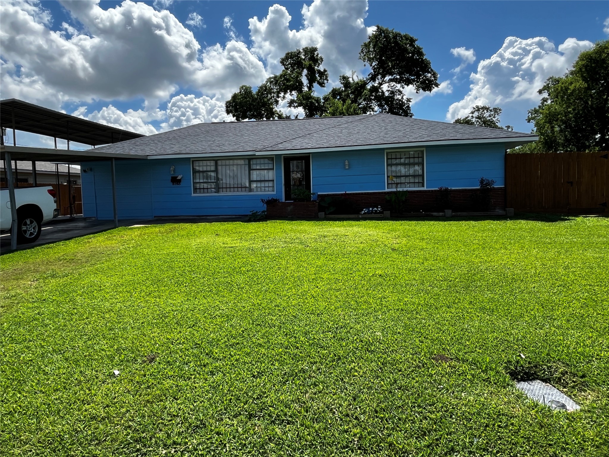 3163 Roe Drive Houston, TX 77087 - Photo 1 of 47 a front view of a house with a yard