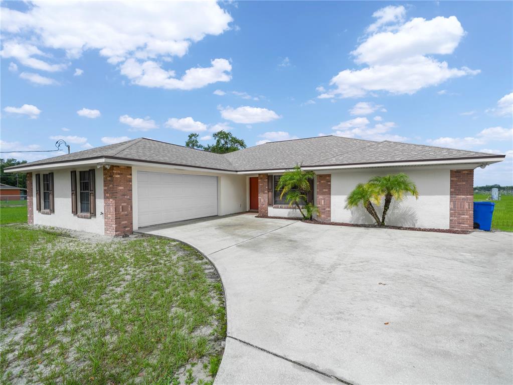 3602 Mott Road Dover, FL 33527 - Photo 1 of 1 a view of a house with a backyard