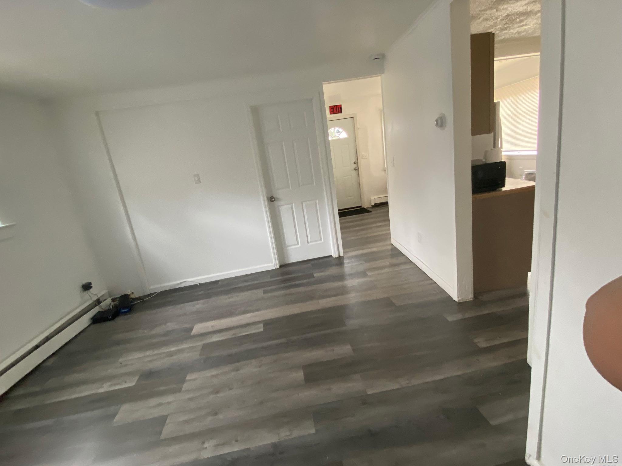 85 Grove Street Newburgh, NY 12550 - Photo 11 of 14 a view of a room with wooden floor