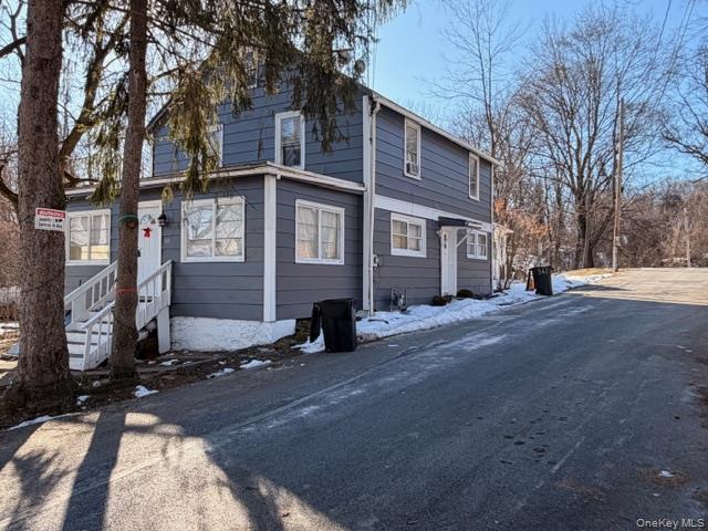 85 Grove Street Newburgh, NY 12550 - Photo 2 of 14 a view of a house with a yard