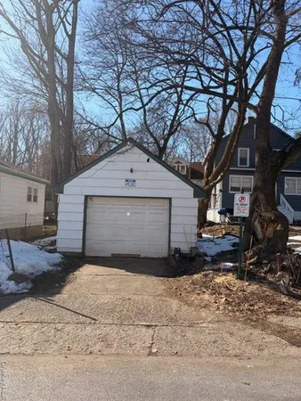 a view of a yard covered in snow